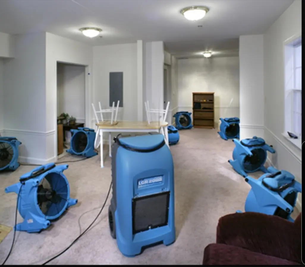 Air movers and dehumidifier setup for Water Damage Restoration in Newburgh